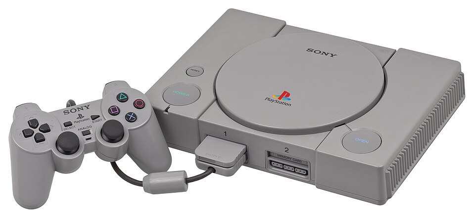 PlayStation original con su mando